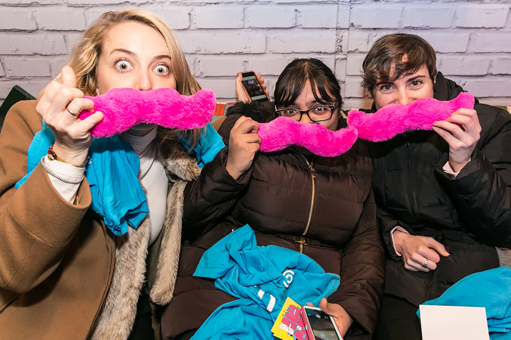 Lyft's fuzzy pink mustaches made for perfect photo props on board Comedy Central's Broad City RV.