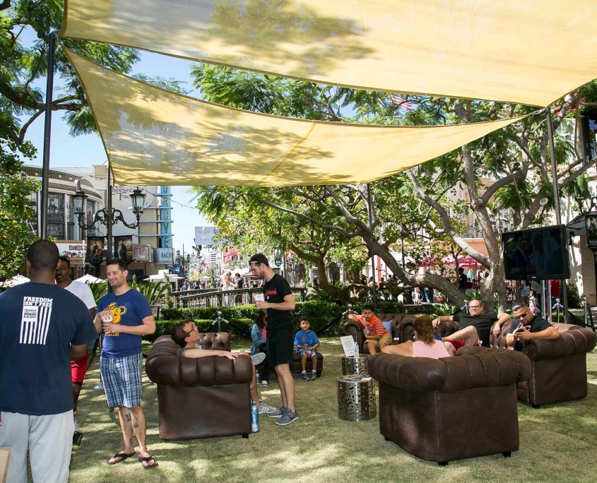 Guests waited their turn for a stye or shave in a comfortable outdoor seating area on the grassy plaza of The Grove LA.