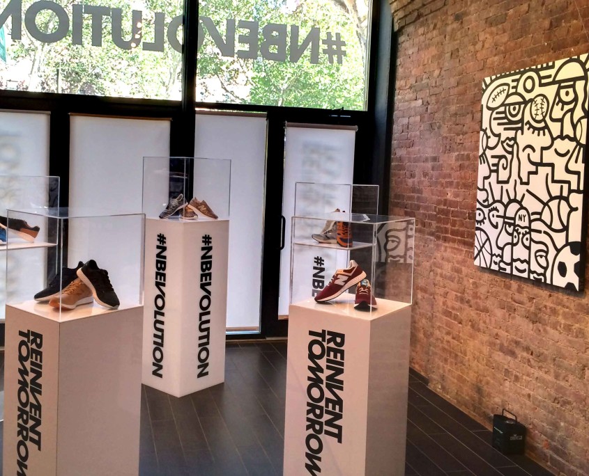 Branded pedestals showcased New Balance's new line of sneakers, allowing guests an in-depth look into the products.