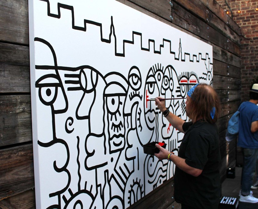 Billy the Artist worked on a painting throughout the New Balance Press Event, entertaining the guests with live art.