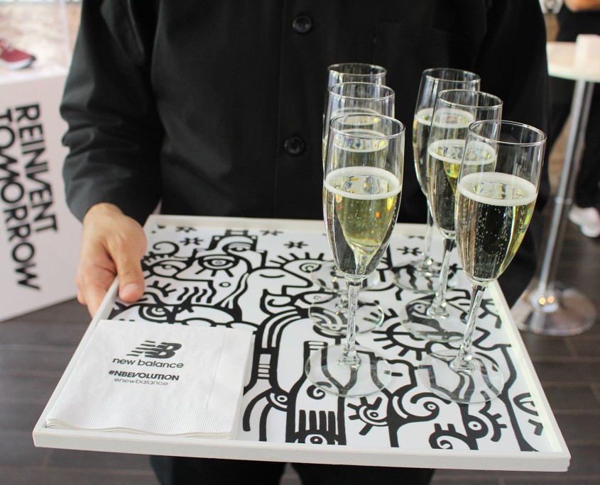 Guests enjoyed drinks and appetizers from trays featuring the work of Billy the Artist, turn the entire press event into an immersive art experience.