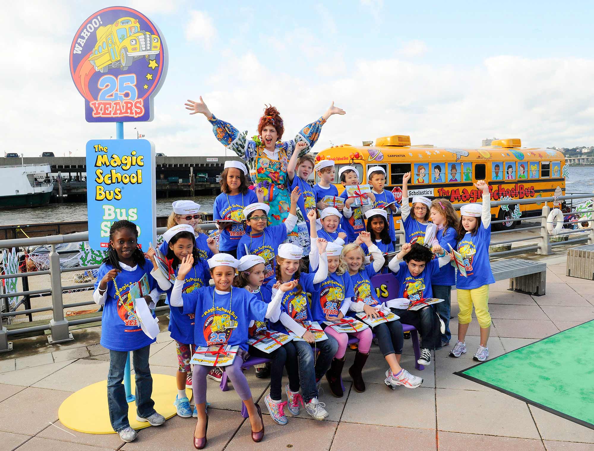 Miss Frizzle from The Magic School Bus poses with the entire class from the United Nations International School.