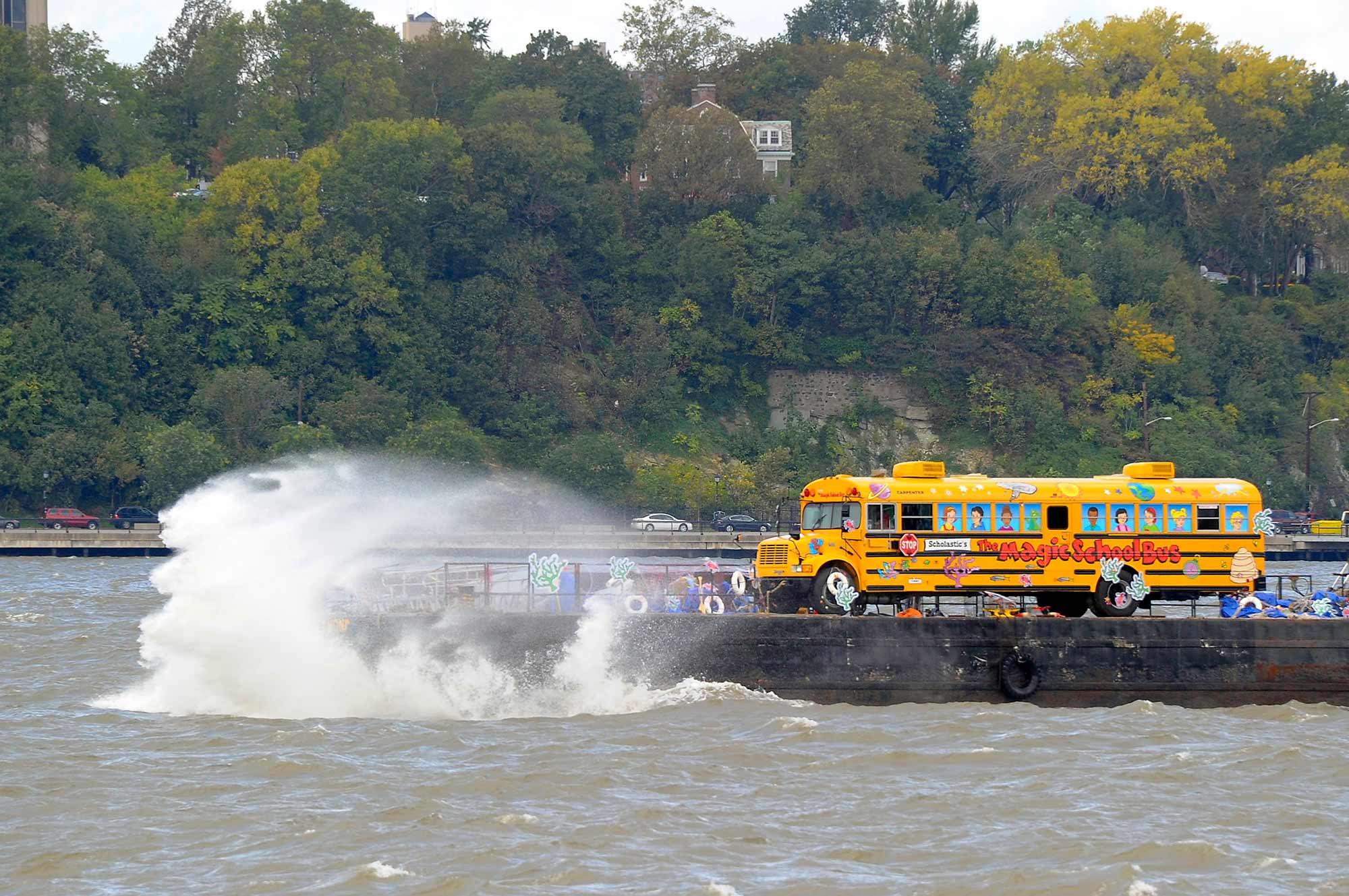 The Magic School Bus rides along the Hudson toward Pier 84.