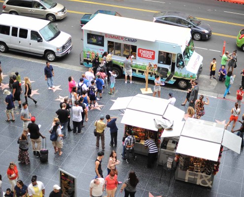 Guests continue to wait for gourmet s'mores from the Summer Camp S'mores Truck along Hollywood's Walk of Fame.