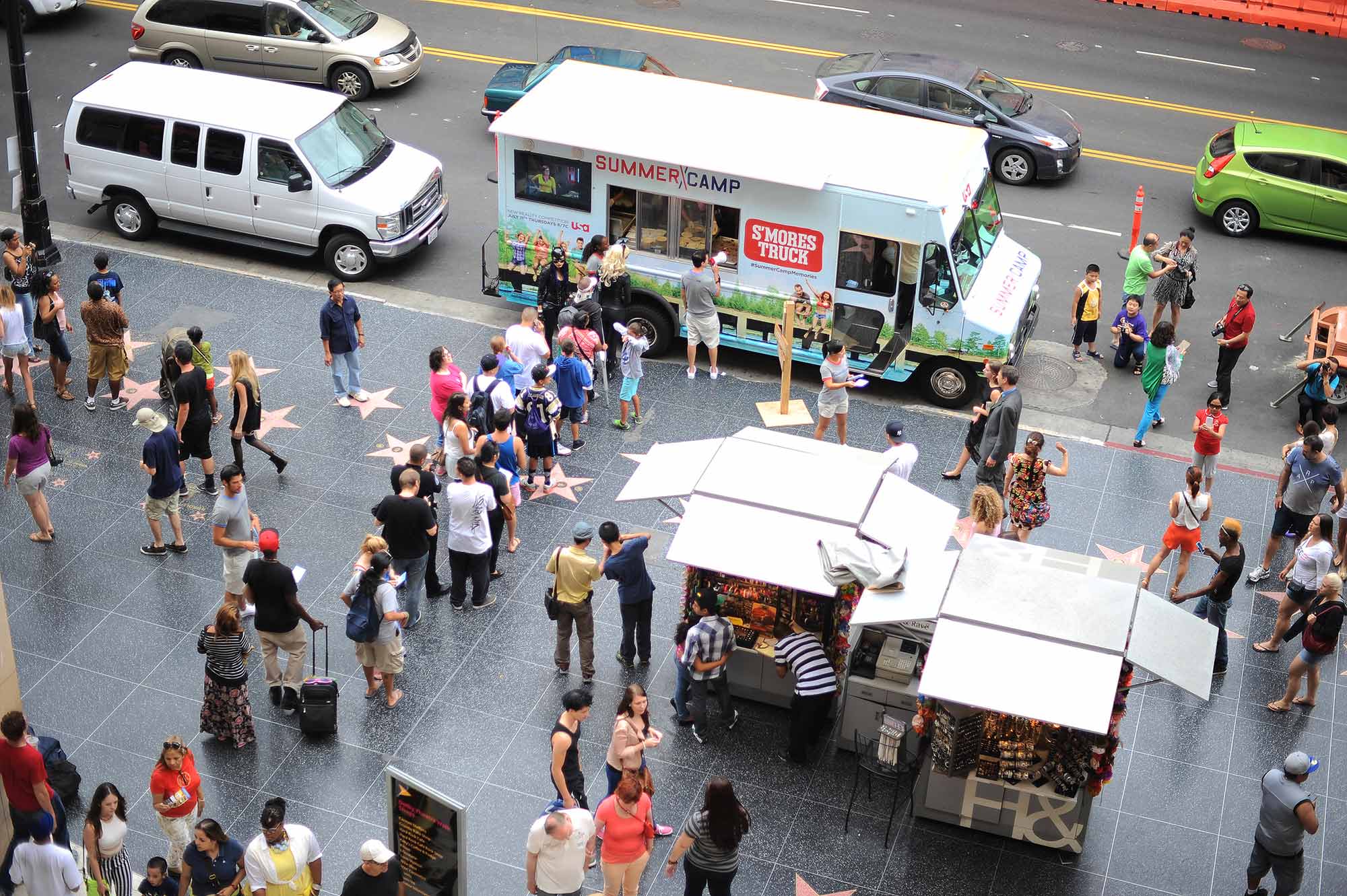 USA Summer Camp Guests continue to wait for gourmet s'mores from the Summer Camp S'mores Truck along Hollywood's Walk of Fame.
