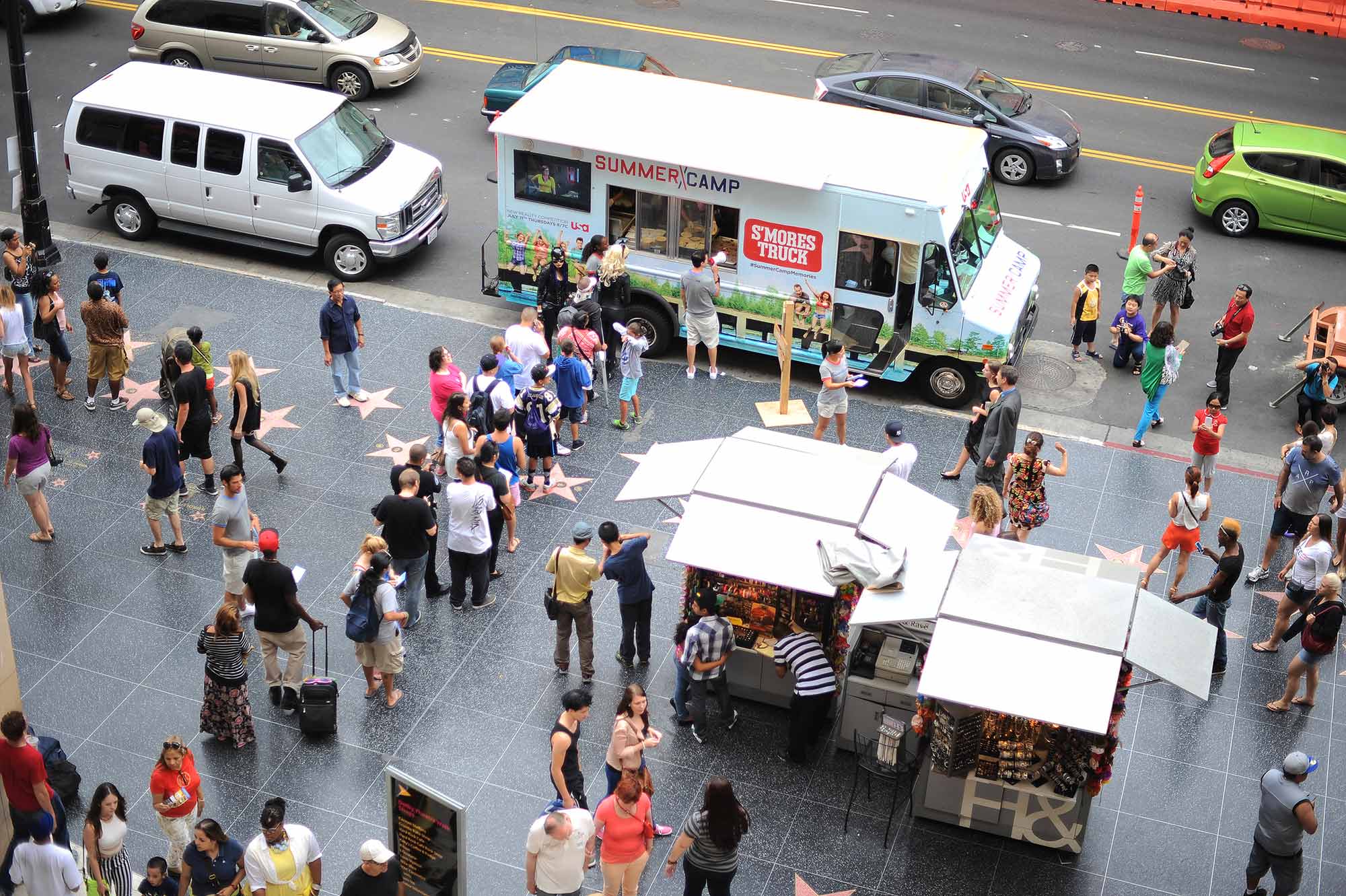 Guests continue to wait for gourmet s'mores from the Summer Camp S'mores Truck along Hollywood's Walk of Fame.